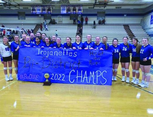 Windthorst poses with the bi-district championship trophy and banner following a 3-0 sweep of DeLeon on Tuesday, Nov. 1, in Weatherford. The Trojanettes advance to meet Sonora in the area round. Courtesy photo