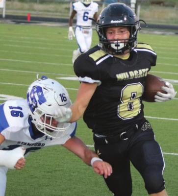Archer City freshman Sam Machtolff is knocked out of bounds in the Wildcats’ 43-20 win over Stamford on Friday, Sept. 24. Photo/Jerry Phillips