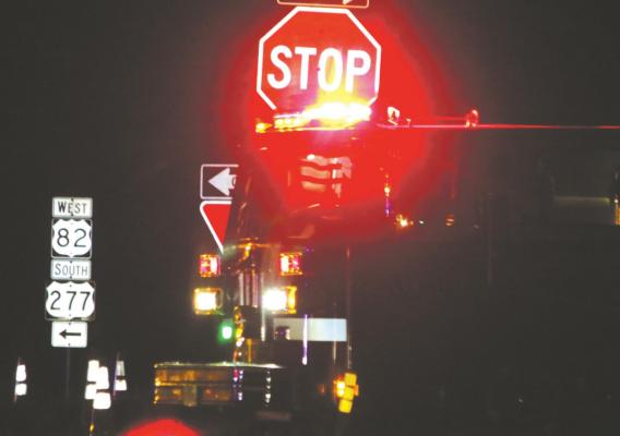 An Archer County Volunteer Fire Department truck helps block the scene of hazmat situation on U.S. 82 just west of FM 368 on Tuesday, Sept. 1, evening. The hazardous material turned out to be helium, a non-toxic gas, leaking from an MRI machine. Photo/Jerry Phillips