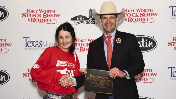 Isabelle Parkey won a $500 purchase certificate toward a beef or dairy heifer for a 4-H or FFA project for exhibition at next year’s Fort Worth Stock Show &amp; Rodeo. The certificate, presented by Stock Show Calf Scramble Committee member, Paxton Motheral, was sponsored by Diamond B Mortgage &amp; Realty. Courtesy photo