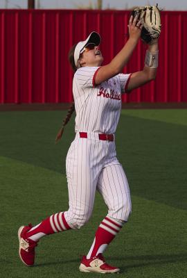 Leftfielder Meritt Morgan camps under a pop fly in Monday’s game against the Trojanettes. Photo/Nathan Lawson