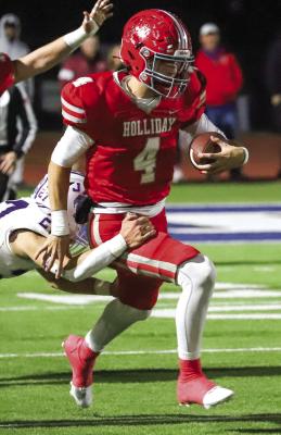Holliday's Grant Cox was named District 6-3A MVP after he passed for 2,607 yards, 33 touchdowns and five interceptions and ran for 965 yards and 18 touchdowns in his senior campaign. File photo