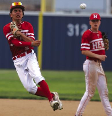 Holliday shortstop Kelson Wales launches an off-balance throw to first for the out in the Eagles’ 16-4 win over Windthorst on Tuesday, March 31. Photo/Landon Davis