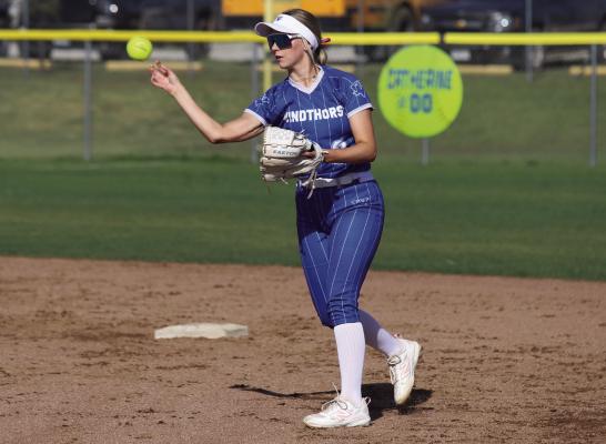 Trojanette second baseman Malory Watson make the throw to first in Windthorst’s district game against Electra on Monday, April 7. Photo/Landon Davis