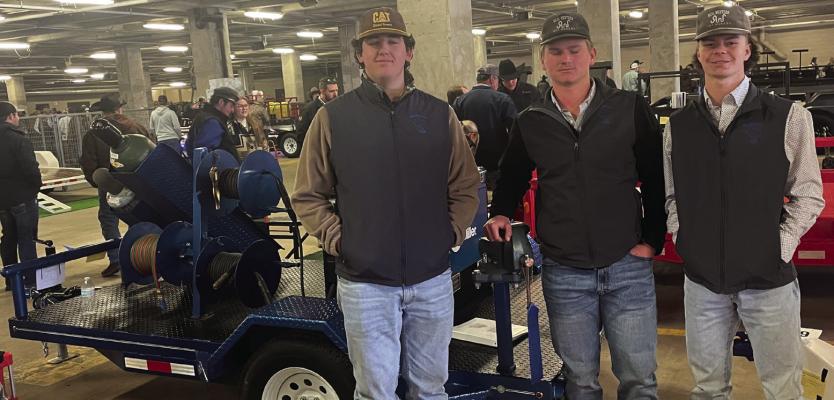 Brady Wolf,Ryder Garrett and Bryson Hoff received a blue ribbon on their welding trailer. Courtesy photo