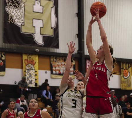 Holliday post Emma Ellis puts up a contested shot in the Lady Eagles’ district matchup with Henrietta on Tuesday, Dec. 31. Photo/Landon Davis