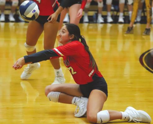 Holliday’s Caroline Case makes a dig in the first set of the Lady Eagles 3-1 win over Brownfield in the regional semifinals on Friday, Nov. 12 at Lubbock Cooper. Photo/Will Edwards