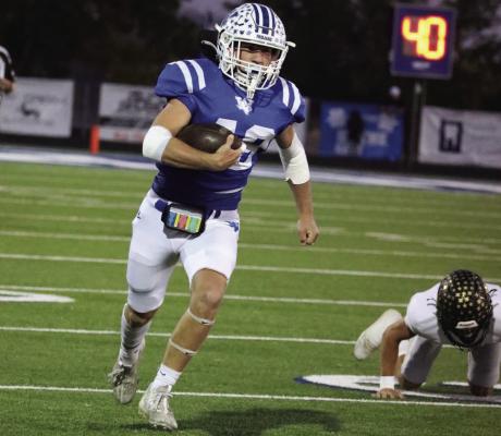 Trojan running back Karson Vieth hustles down the field against the Haskell Indians on Friday, Oct. 25. Courtesy photo/Jamie Anderle