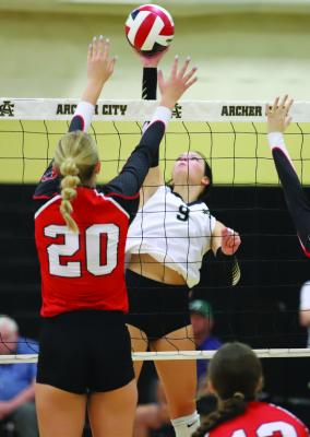 Archer City’s Brilee Canada tips over a score in the Lady Cats’ 3-0 sweep over Olney on Saturday, Sept. 27. Photo/Landon Davis