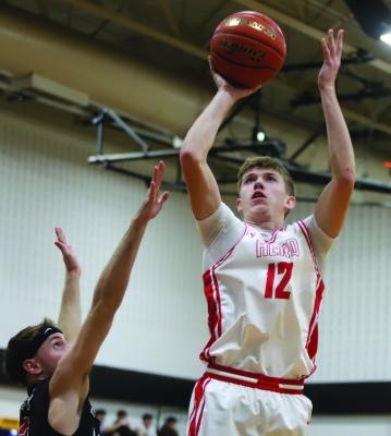Eagle Forward Preston Fandler puts up a shot over a Brownfield defender in Holliday's 64-56 Regional Semi-Finals loss on Tuesday, March 3. Photo/Landon Davis