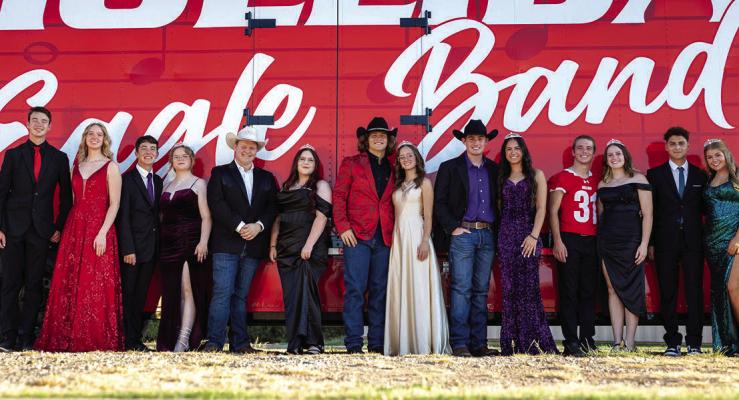 Holliday Band Sweethearts nominees Caitlyn Willis,Grace Vestal, Kylie Martinez, Emma McKnight, Kenzie Barnes, Shay Hayden, and Aubrey Strealy with their escorts. Courtesy photo/Jim Harrison