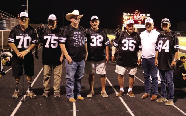 Members of the 1964 Wildcats team were recognized at halftime of the Wildcats homecoming win over Nocona on Friday, Sept. 20. The team is celebrating their 60th anniversary of their state title win this year. Photo/Jerry Phillips