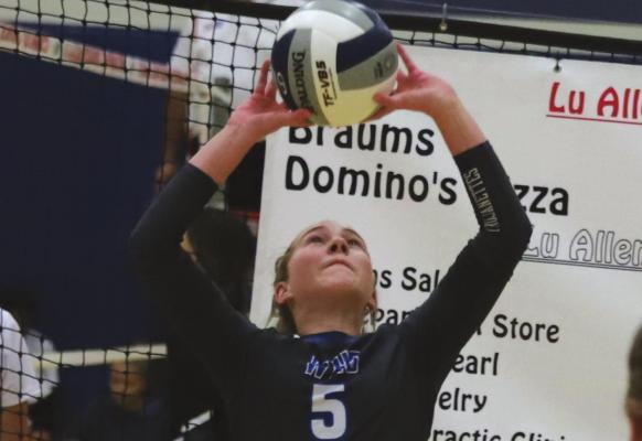 Windthorst freshman Megg Lindley sets the ball in the second set of the Trojanettes 2-0 win over Jacksboro on Friday, Aug. 20, at the Lu Allen Memorial Tournament. Photo/Will Edwards