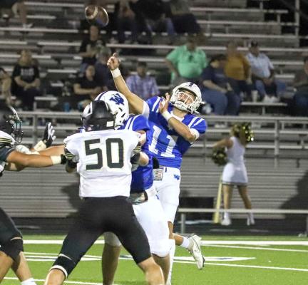 Cope leads Trojans past Wheeler, 47-16