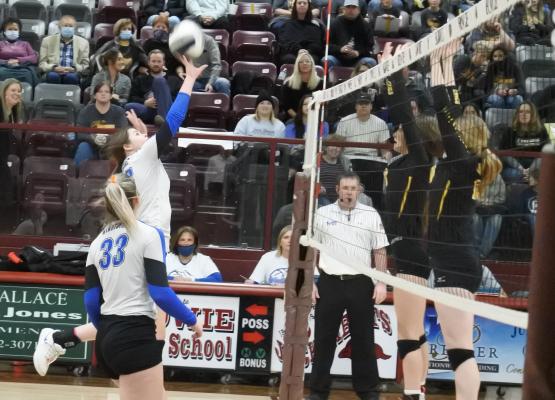 Senior Kacee Teichman goes up for an attack in the first set of Windthorst’s 3-0 bi-district loss to Chico on Thursday, Oct. 29, in Bowie. 