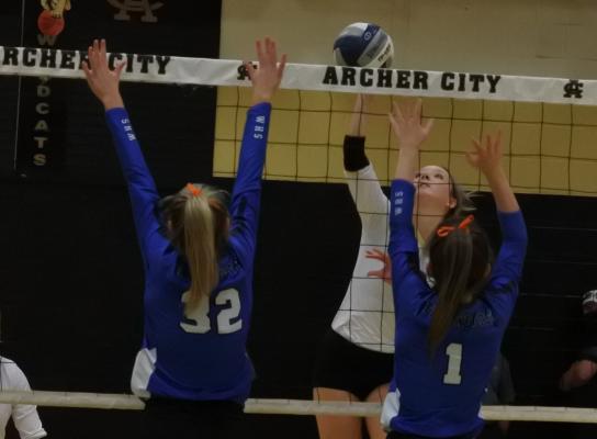 Archer City junior Chandler Clark swings in the first set of Archer City’s 3-2 win over the Trojanettes on Tuesday, Oct. 13, in Archer City.