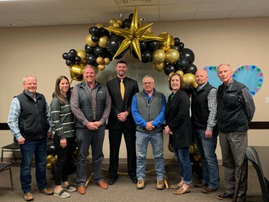 Bradan Ritchey (center) was named the next Athletic Director/Head Football Coach at the Archer City ISD School Board meeting Monday night.