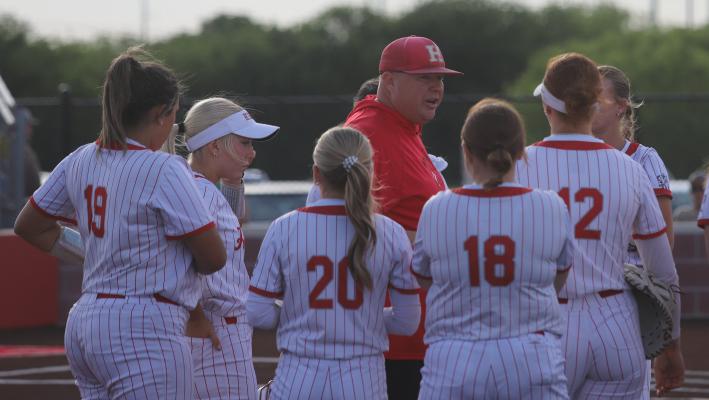 Coach Billy Arbogast speaks with his Lady Eagles during a break in action this season. Arbogast received public support from players, parents, and community members during Monday’s Holliday ISD School Board meeting.