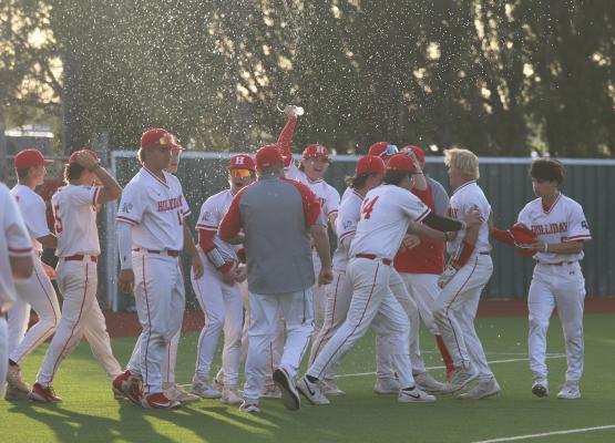 Holliday celebrates