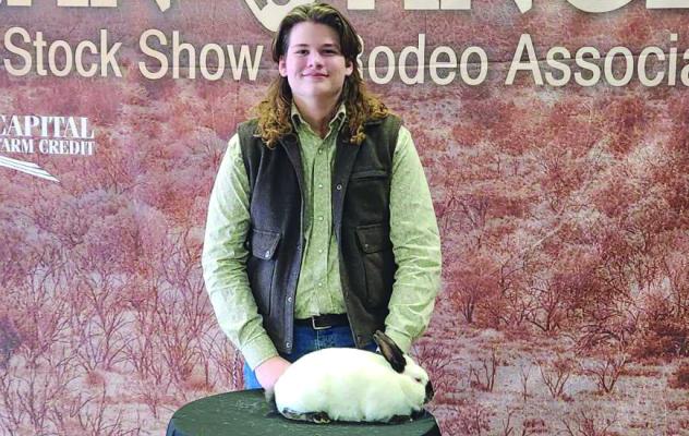 Evan Hughes showed the 11th place doe at the San Angelo Rabbit Show. Courtesy photo