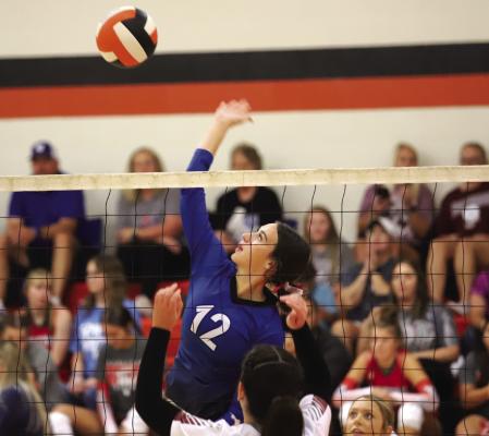 Junior Kyah Frank goes for a kill against Vernon Northside in the Cool in Boomtown volleyball tournament Photo/Landon