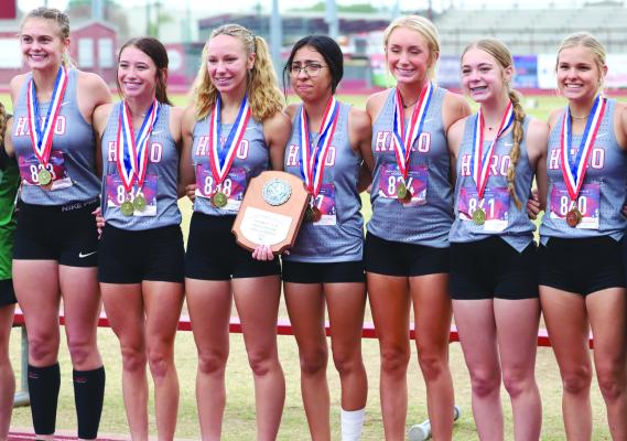 The Lady Eagles cross country team ran away with the District 7-3A meet on Monday, Oct. 10. (L to R) Bailee Bowers, Jaycee Lyons, Simone Mouras, Anahi Machuca, Briar Griffin, Hadley Vicars and Jaci Shepherd. Photo/Will Edwards