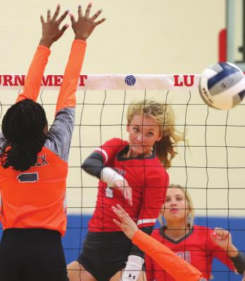 Holliday senior Payton Murray puts down a kill in the second set of the Lady Eagles’ 2-0 win over Caprock on Friday, Aug. 20, at the Lu Allen Memorial Tournament. Photo/Will Edwards