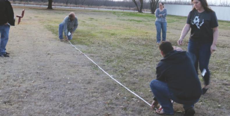 Mayor Ron Hoff and Louis Garrett take a measurement for the proposed bathroom at the Scotland City Park.Photo/Jerry Phillips