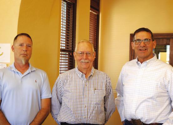 Archer County Veterans Services Officer Wayne McCallum (middle) has retired and Jason Deekan (left) has been named as replacement by County Judge Randy Jackson (right). Photo/Jerry Phillips