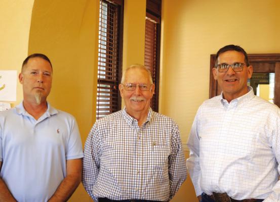 Archer County Veterans Services Officer Wayne McCallum (middle) has retired and Jason Deekan (left) has been named as replacement by County Judge Randy Jackson (right). Photo/Jerry Phillips