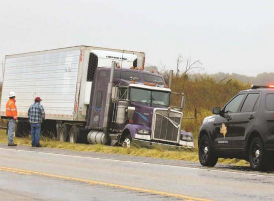 Truck hydroplanes on Hwy.114