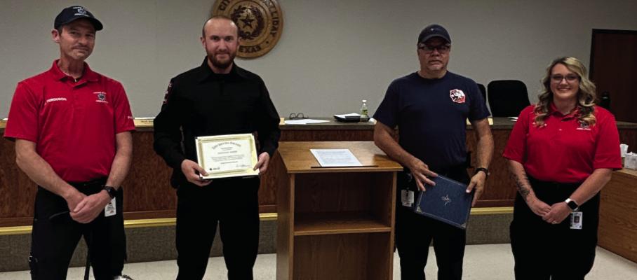 TranStar EMS recognized Holliday Police Officer Christopher Simmons (Left Center) and Holliday Volunteer Fire Department Paramedic Wade Penner for their lifesaving efforts during an emergency event on April 4. Photo/Callie Lawson