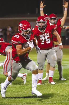 Holliday junior Tyrese Polite breaks loose for a long touchdown run in the fourth quarter of the Eagles’ 28-7 win over Iowa Park on Friday, Aug. 26. Photo/Will Edwards