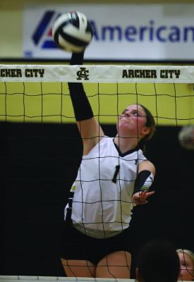 Archer City’s Jocelyn Tedrow hammers down a kill in the Lady Cats’ home double-header against Quanah and Newcastle on Tuesday, Aug. 12. Photo/Landon Davis