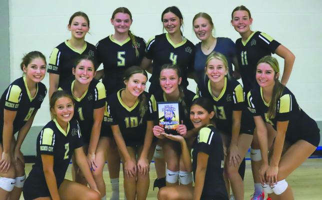 Trojanettes run the table at Cool in Boomtown; Lady Cats win consolation