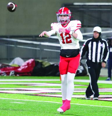 Holliday quarterback Hunter Jones sends a spiral to his left side in the Eagles’ State Quarterfinals round matchup versus the Gunter Tigers. Photo/Landon Davis