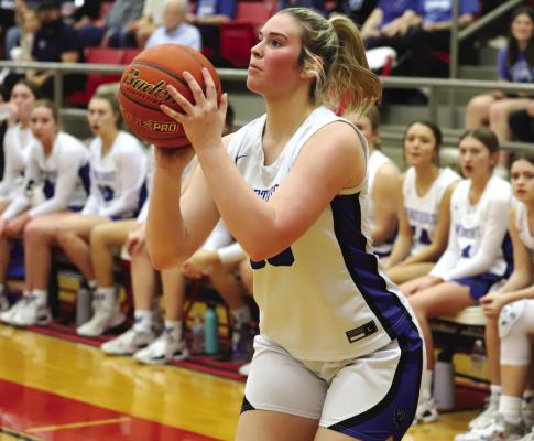 Windthorst senior Tara Tackett lines up a 3-pointer in the fourth quarter of the Trojanettes’ 47-30 regional quarterfinal loss to No. 3 Lipan on Tues., Feb. 21. Photo/Will Edwards