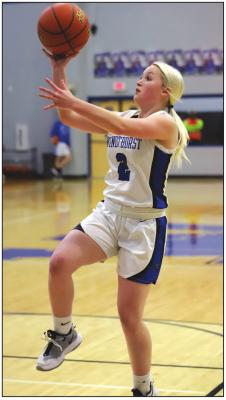 Camryn Latham took home second team all-district honors as the lone senior on the Trojanettes, producing 8.7 points and 1.5 assists per game.. Photo/Will Edwards