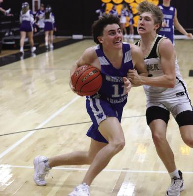 Windthorst senior Logan Cope helped the Trojans to a 10-20 record this season en-route to earning a second team all-district selection. File photo