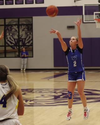 Senior Megg Lindley launches a three-pointer in the Trojanettes’ Area matchup versus Lipan on Thursday, Feb. 13. Photo/Landon Davis