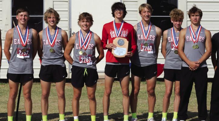 Holliday Boys’ Cross Country runners (L-R) sophomore RC Albert, sophomore Connor Killian, junior Tanner Simmons, junior Ryder Strohman, sophomore Scout Henry, freshman Kohlson Delcambre, and junior Noah Strohman took home first place with 21 points at the district meet on Monday, Oct. 7. Photo/Landon Davis