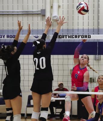 Senior Megg Lindley tips over a kill in Windthorst’s State Semifinal game versus the Crawford Lady Pirates on Monday, Nov. 18. Photo/Landon Davis