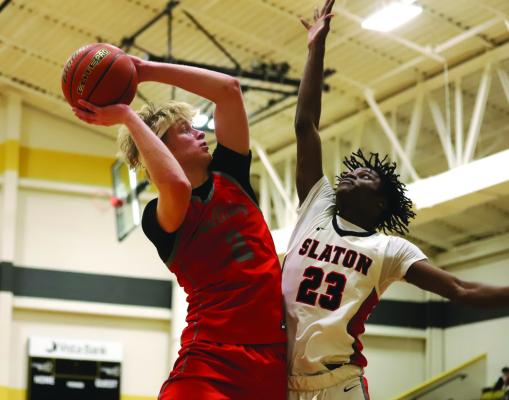 Senior Ashtyn Berry puts up a difficult layup in Holliday’s Regional Semifinals playoff game versus Slaton on Tuesday, Feb. 25. Photo/Landon Davis