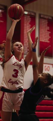 Holliday post Emma Ellis towers over a City View defender for a bucket on Tuesday, Dec. 16. Photo/Landon Davis