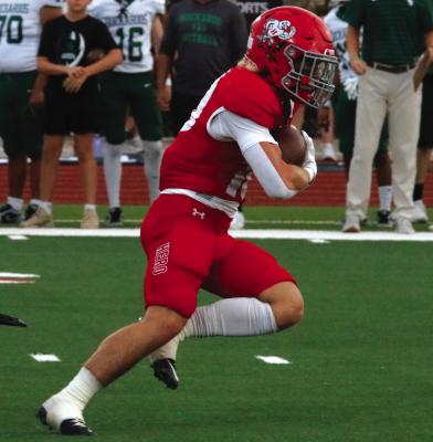 Holliday running back Steele Skinner finds room against Breckenridge in the Eagle’s football home-opener. Skinner finished the night with 76 rushing yards and one rushing touchdown. Photo/Landon