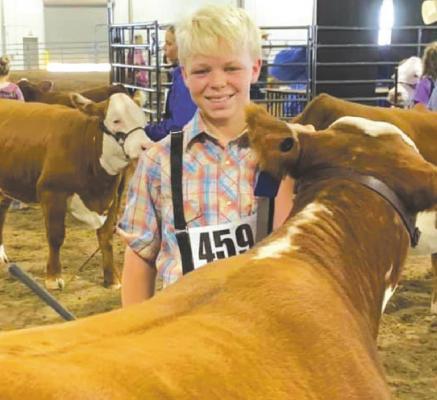 Hunter Talley placed first in the Hereford Heifer Class during the West Texas Fair in Abilene in September. Courtesy photo/Maranda Revell