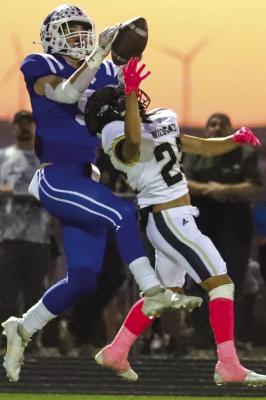 Trojans’ O-Line paves way for win over Wildcats, 28-13