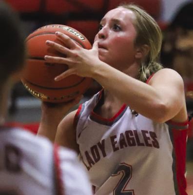 Holliday’s Braylie Womack lines up a shot in the Lady Eagles’ setback to third-ranked Decatur. Photo/Will