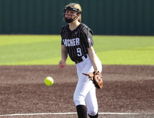 Archer City’s Brynlee Skelton offers up a strike in the Lady Cats’ 14-1 loss to Haskell as part of the Graham tournament on Friday, March 9, in Iowa Park. Photo/Will Edwards