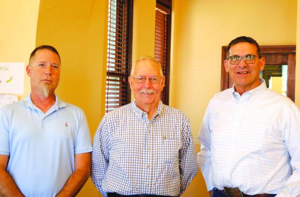 New Archer County Veteran Services Officer Jason Deekan, outgoing VSO Wayne McCallum and Archer County Judge Randy Jackson pose for a photo. Deekan will help Archer County veterans get benefits from the Veterans Affairs office. Photo/Jerry Philips